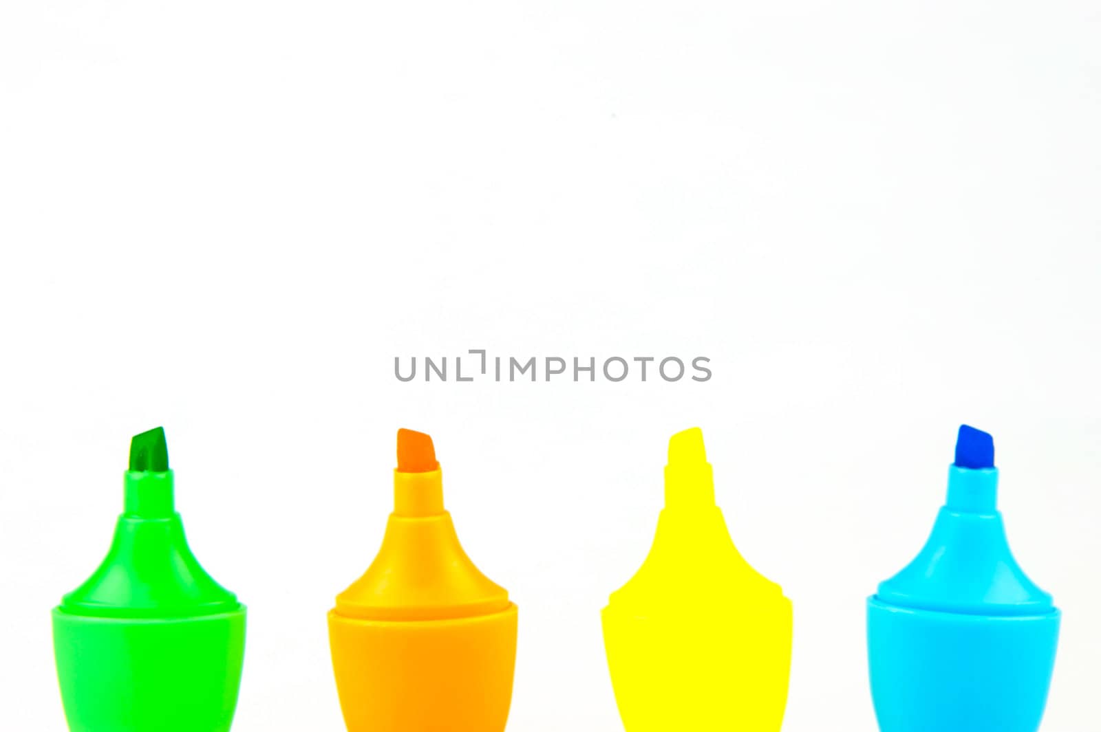 Mini highlighers isolated against a white background