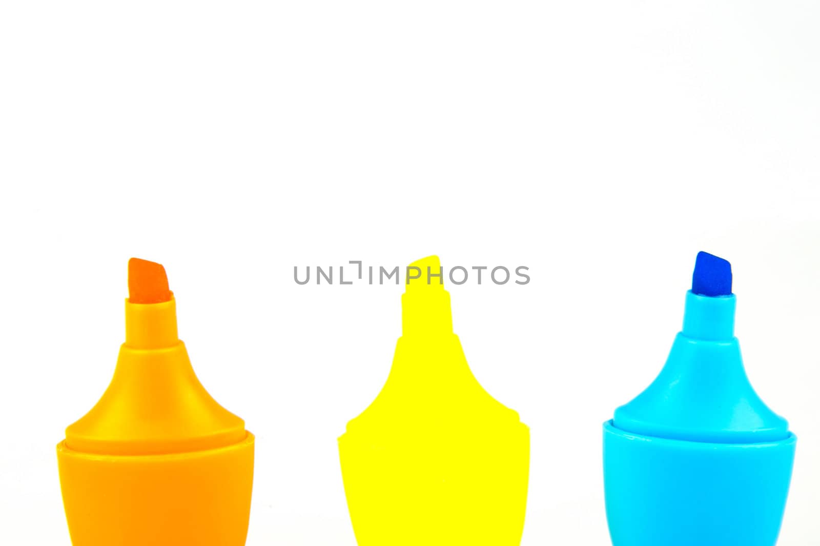 Mini highlighers isolated against a white background