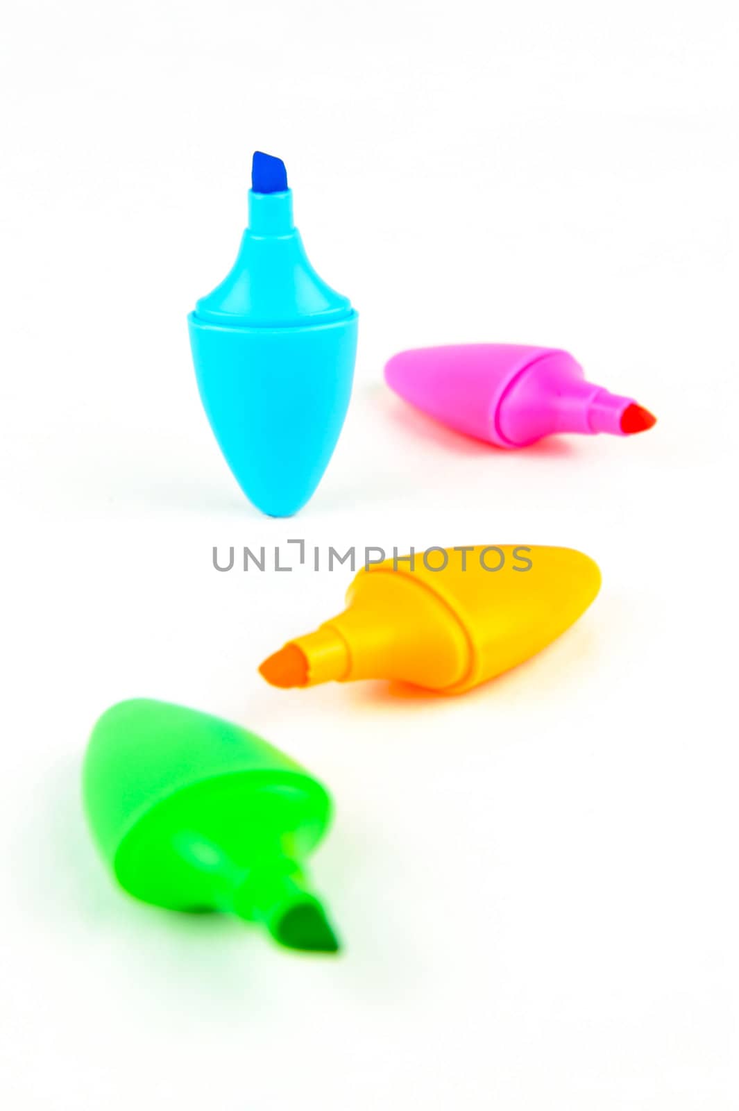 Mini highlighers isolated against a white background