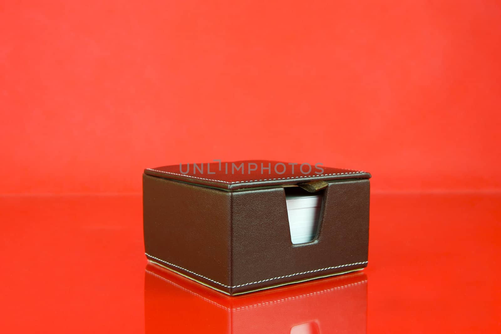 A note block isolated against a red background