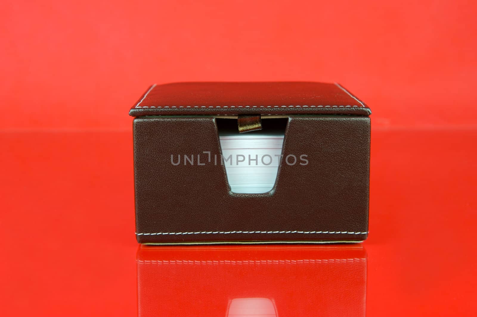 A note block isolated against a red background