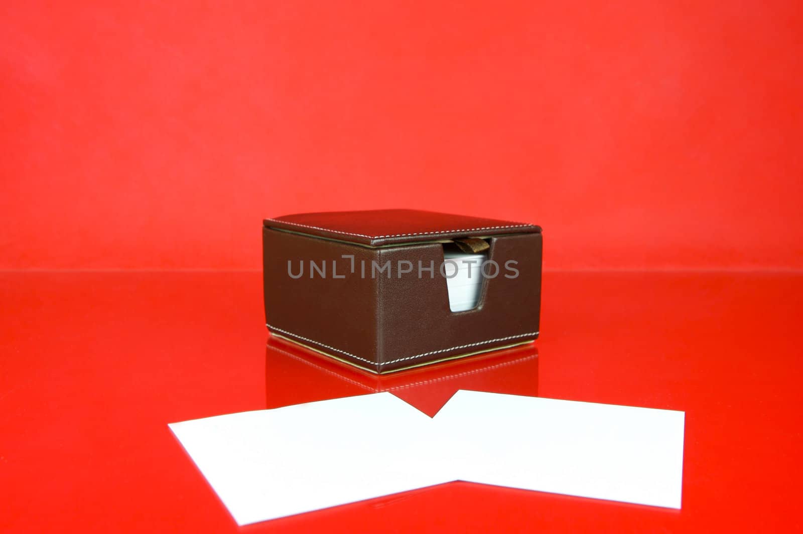 A note block isolated against a red background