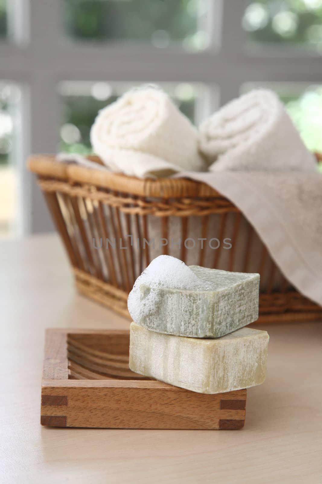 Soaps,towels and boobles with a blurred background