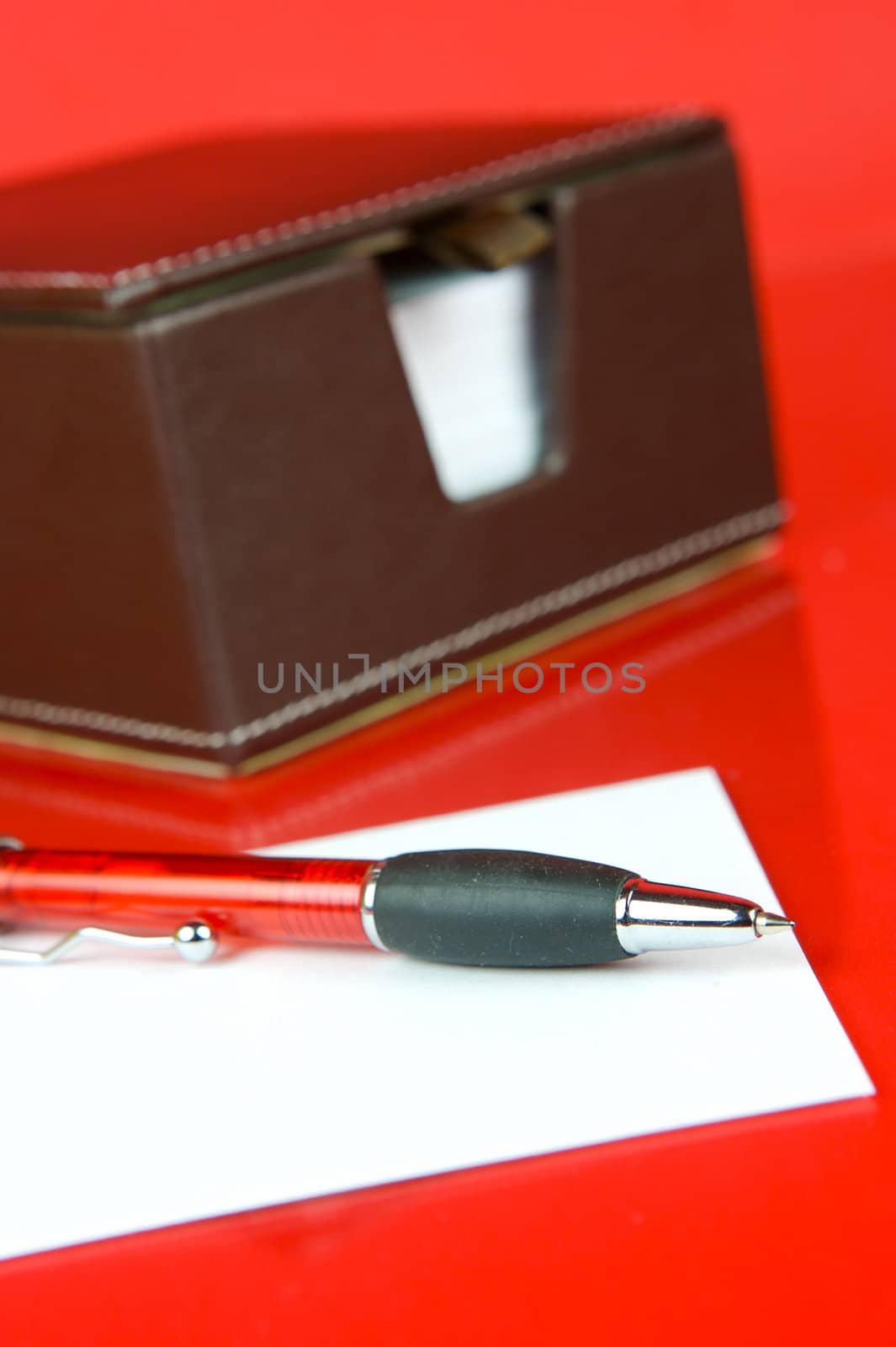 A note block isolated against a red background