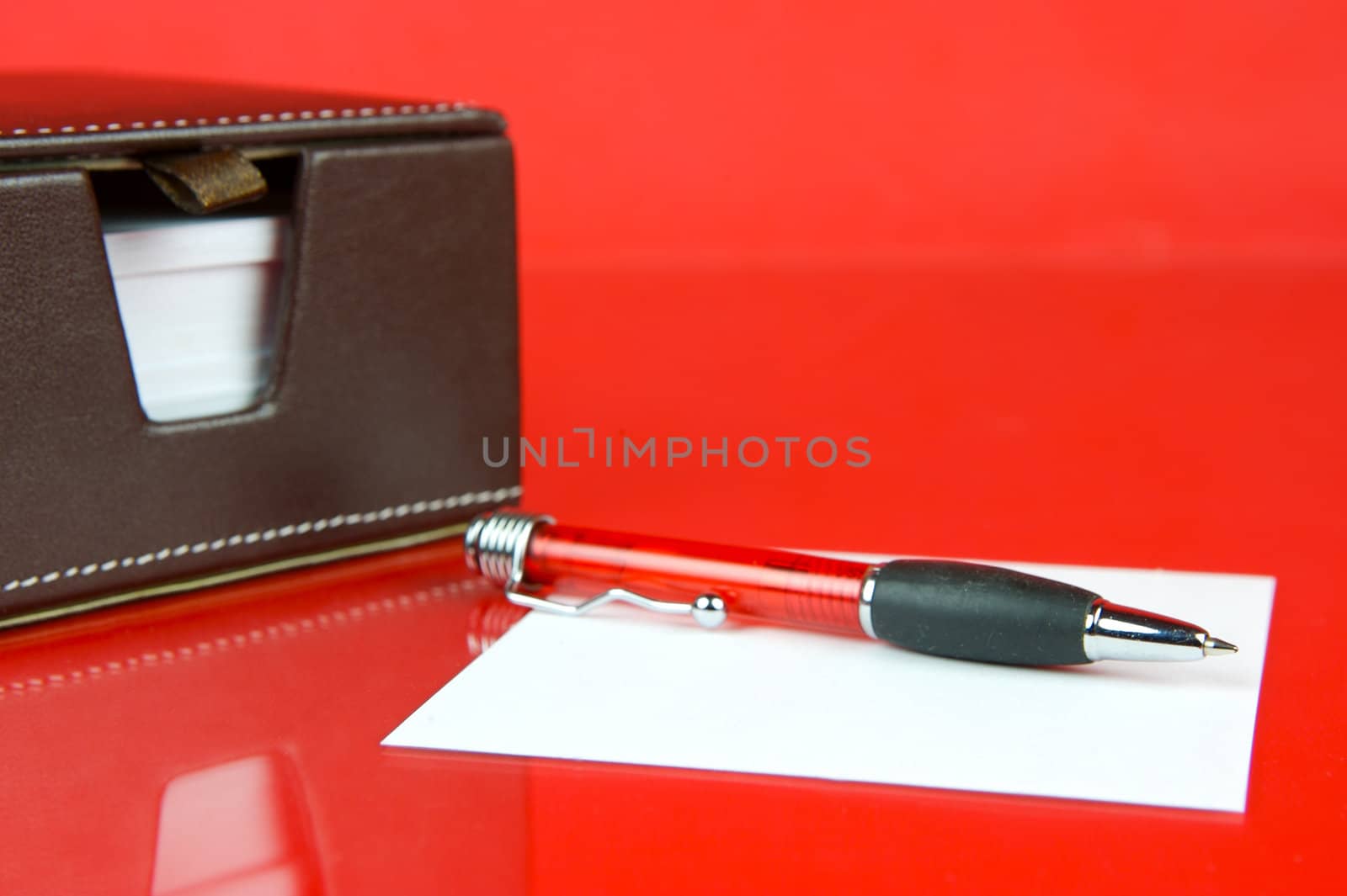 A note block isolated against a red background