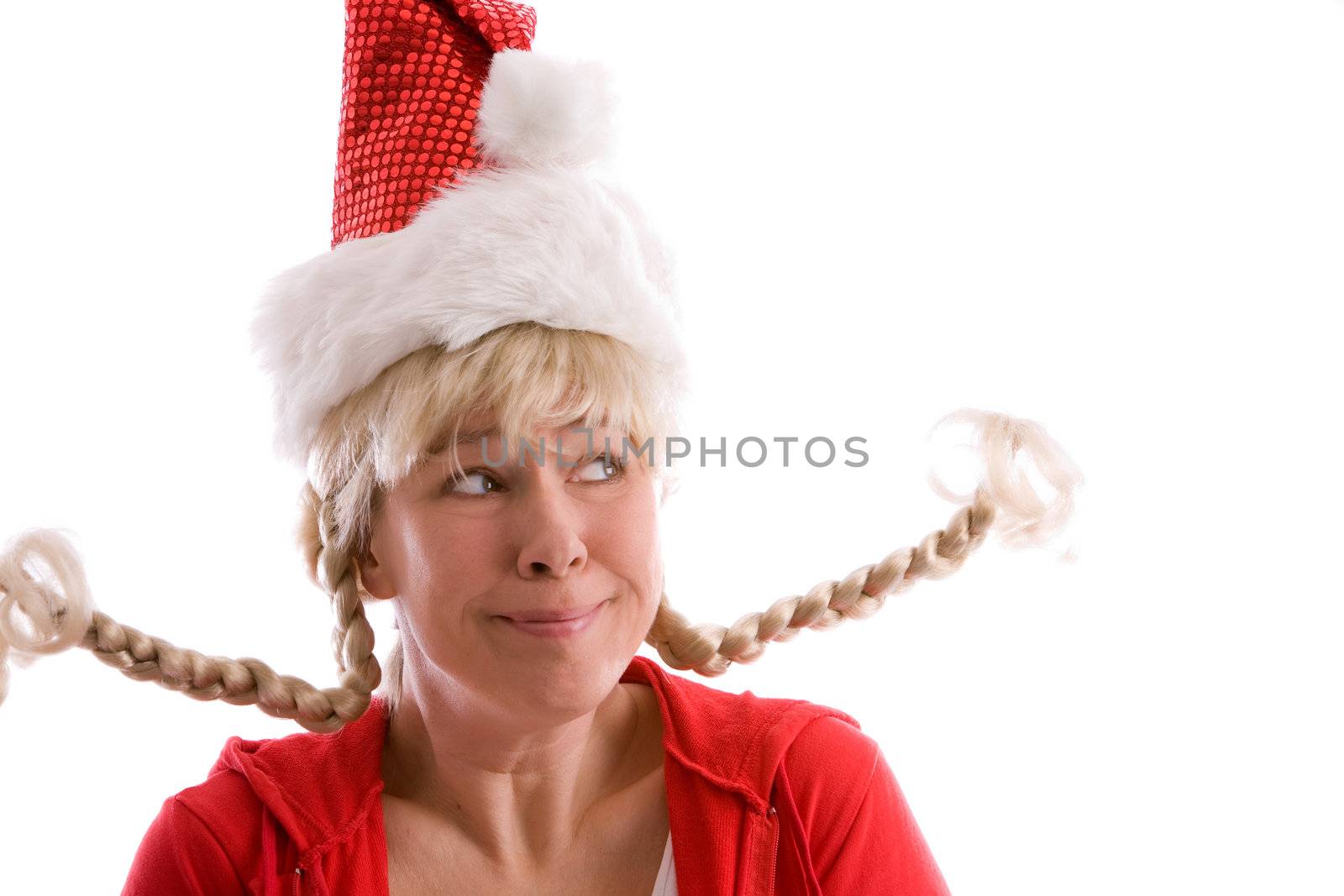Mature woman with christmas hat and two funny pigtails