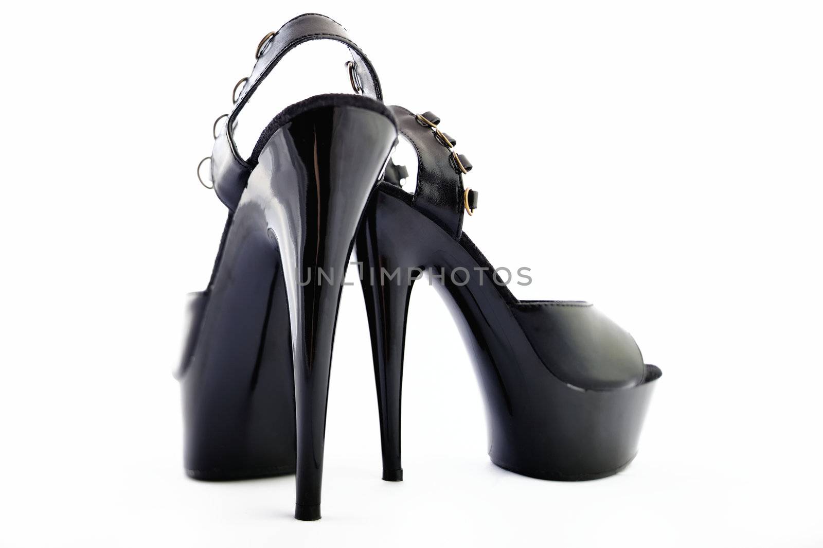 Elegant black patent-leather shoes, on high heel