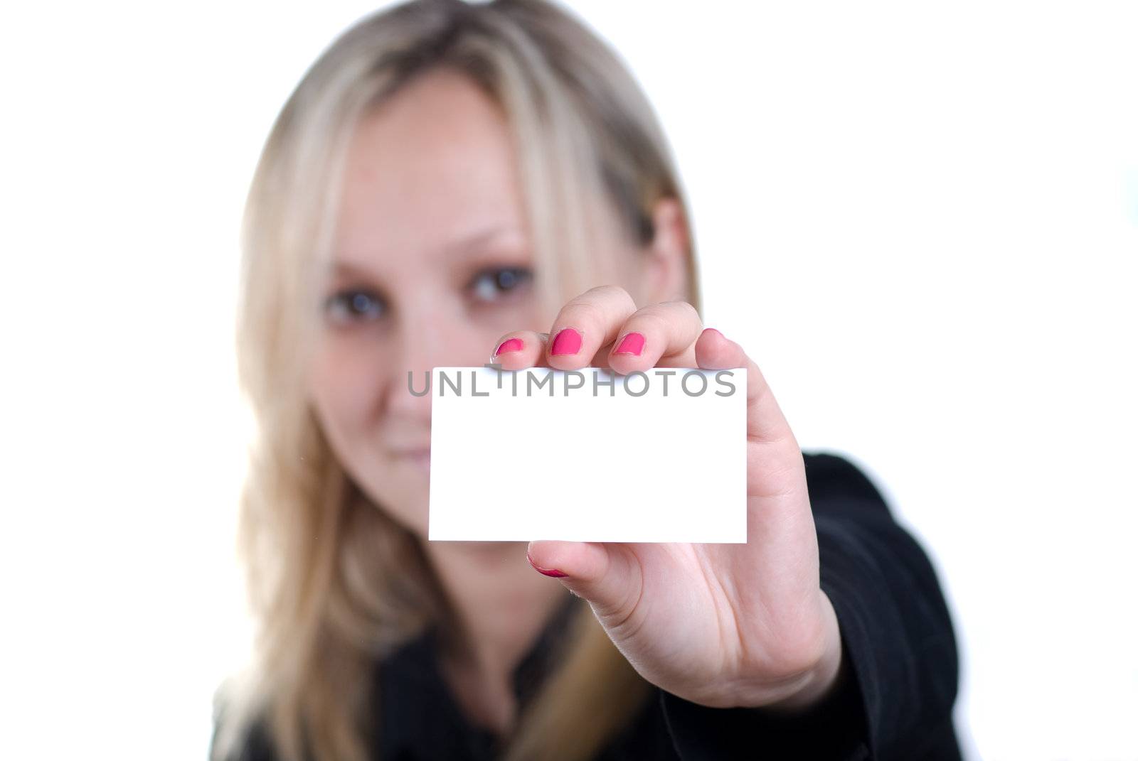 young woman showing his business card, focus on fingers and card.
