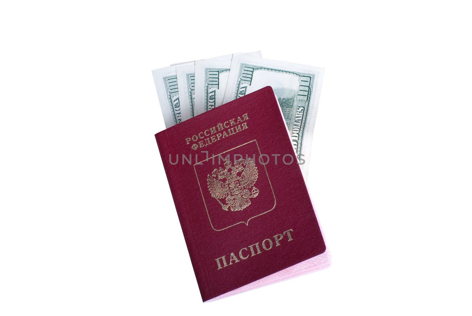 The Russian passport with the dollars enclosed in it. It is isolated on a white background.