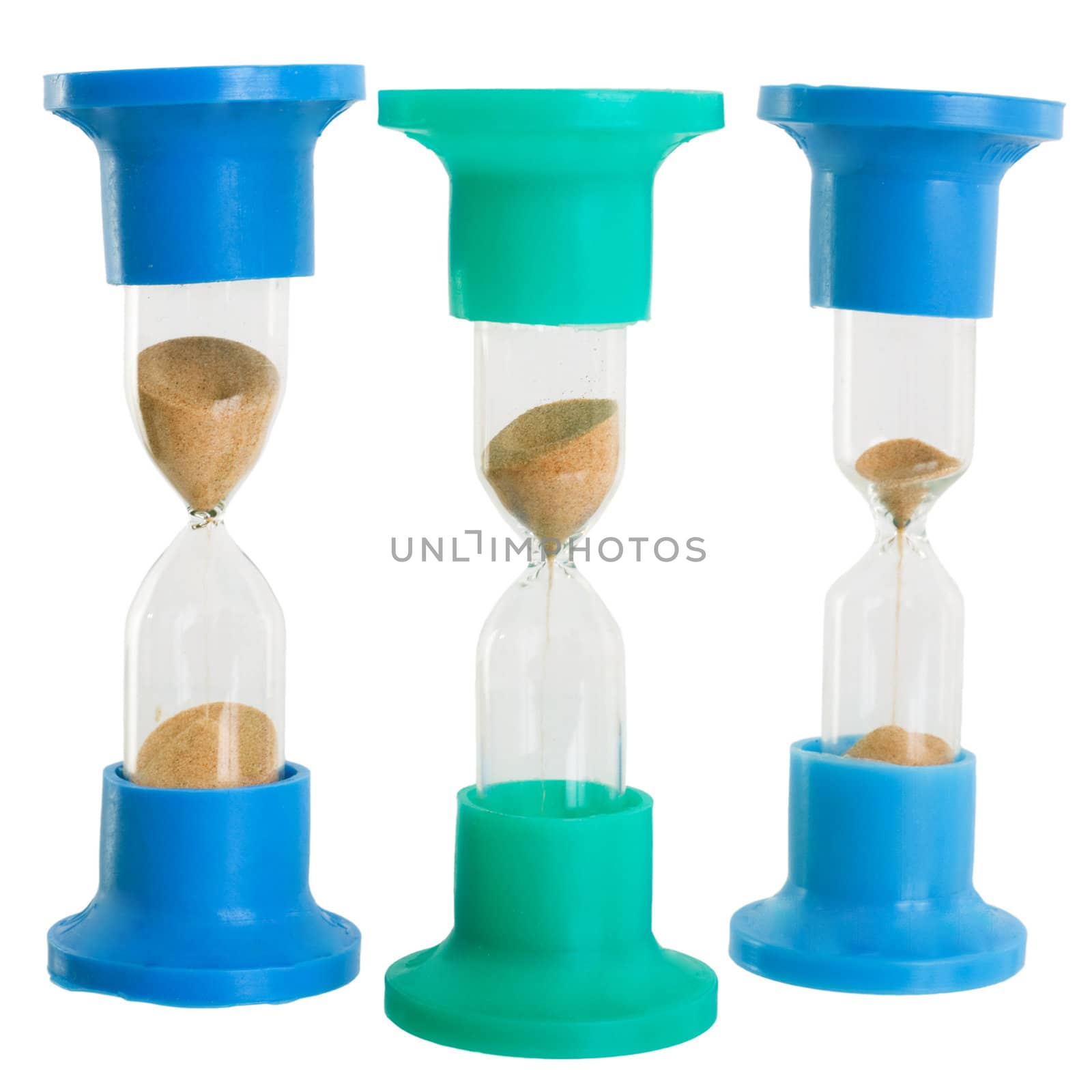 Hourglass on plastic stand on the white background