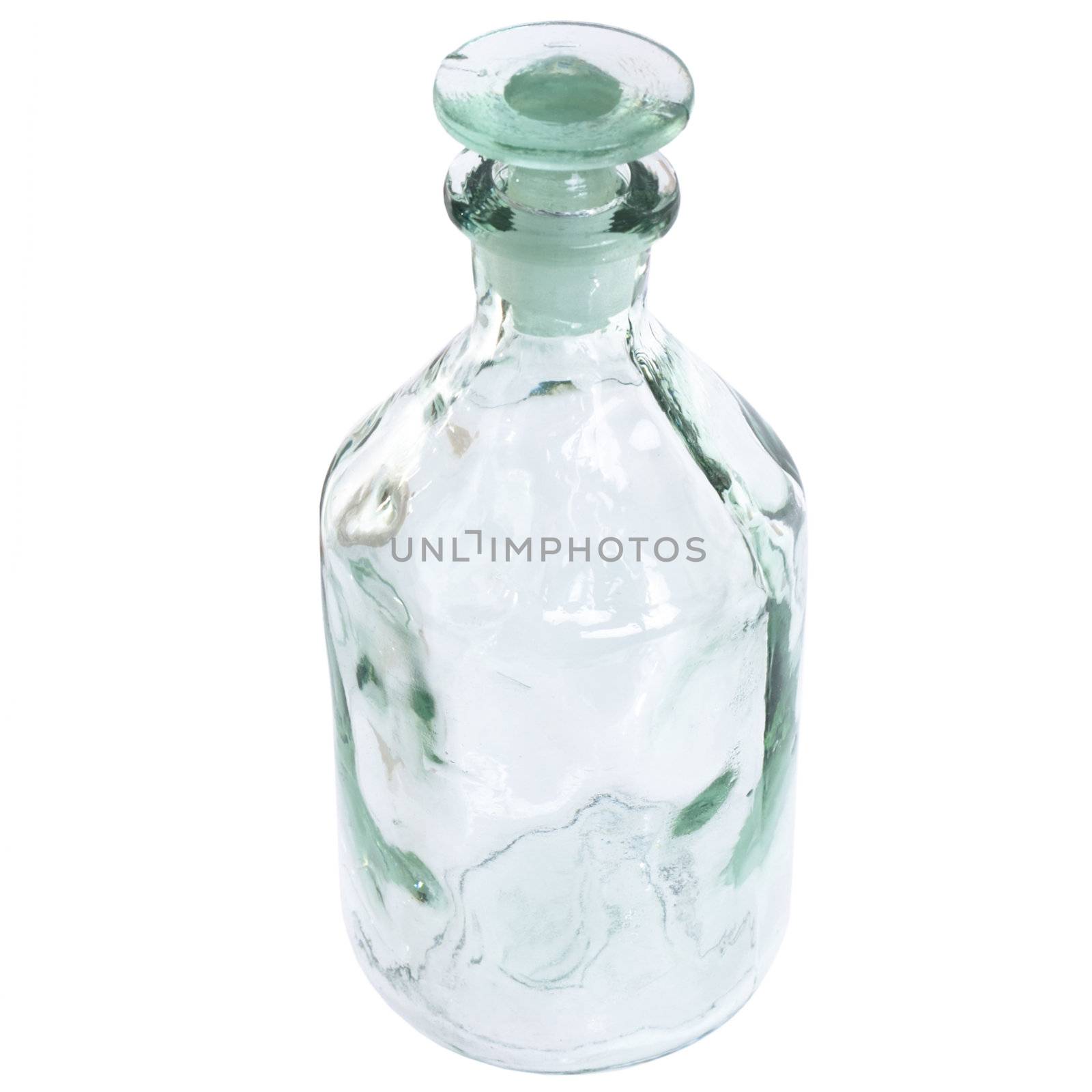 Small bottle from glass on the white background