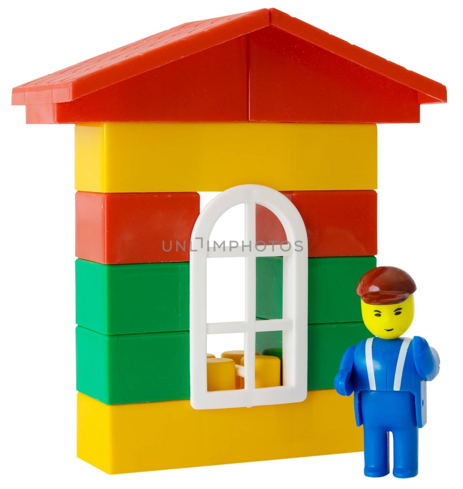 Toy plastic colored house and toy little man