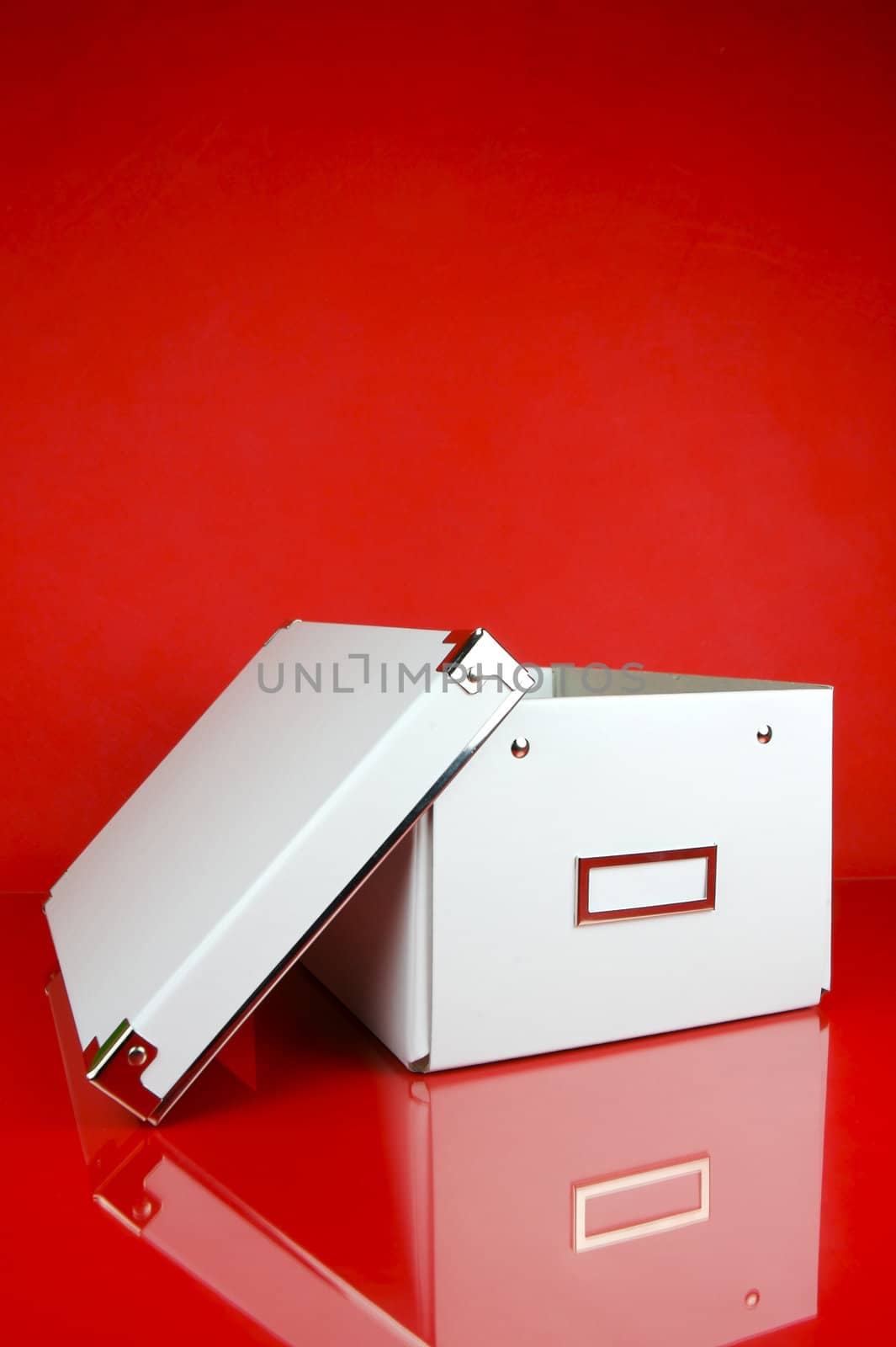 Storage boxes isolated against a red background