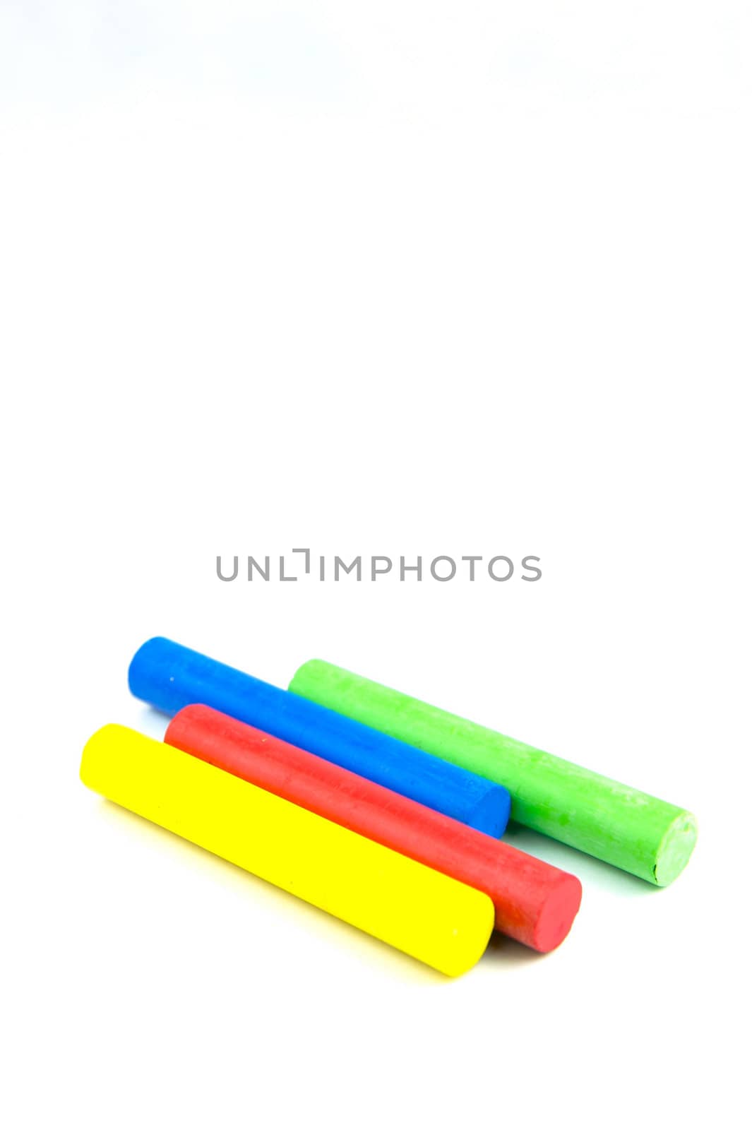 Oil pastels/crayons isolated against a white background