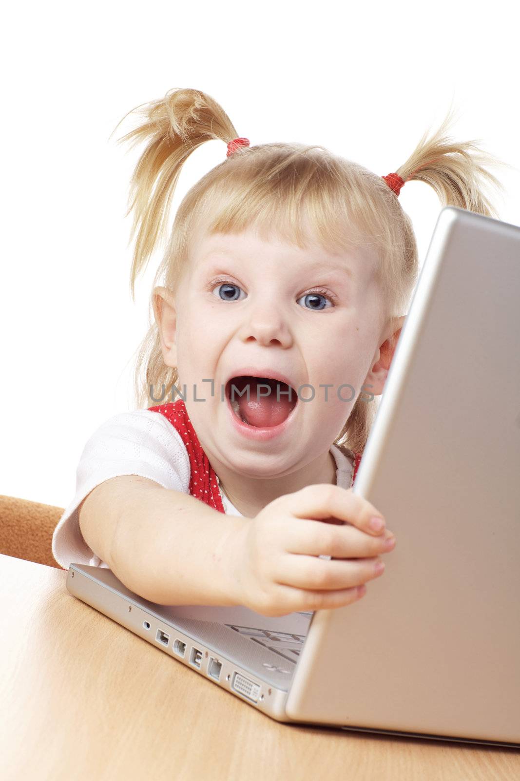 happy child and laptop by vsurkov