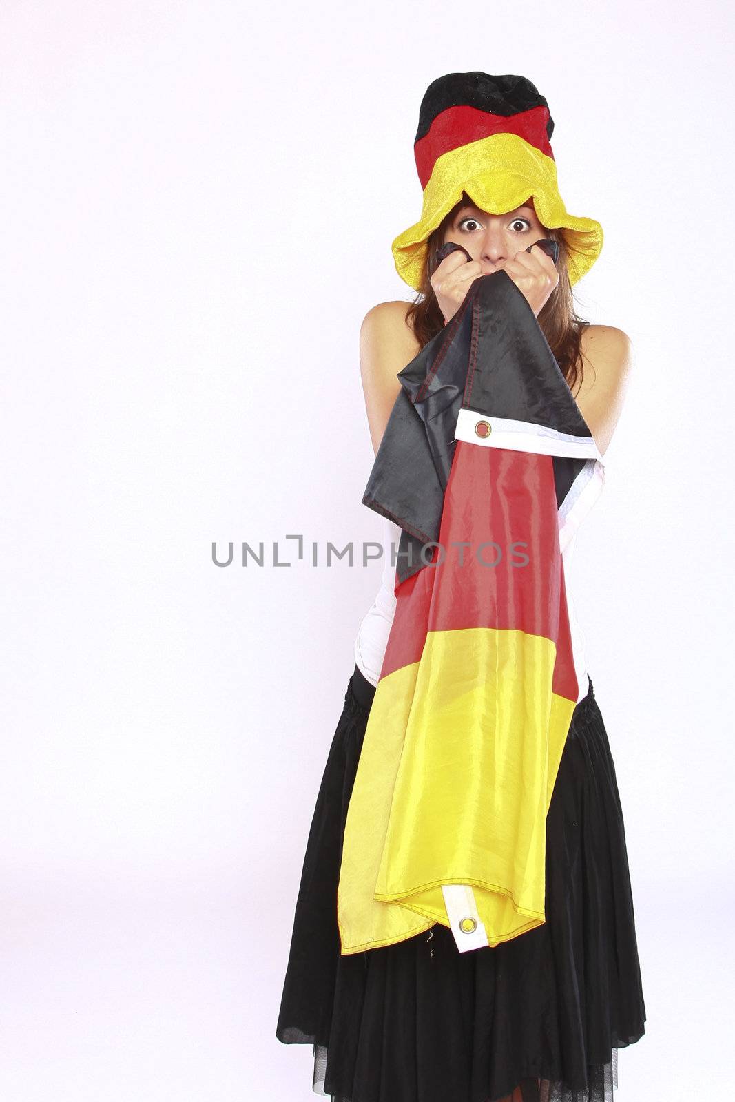 Excited Soccer Fan Girl Wearing The National German Flag And Hat