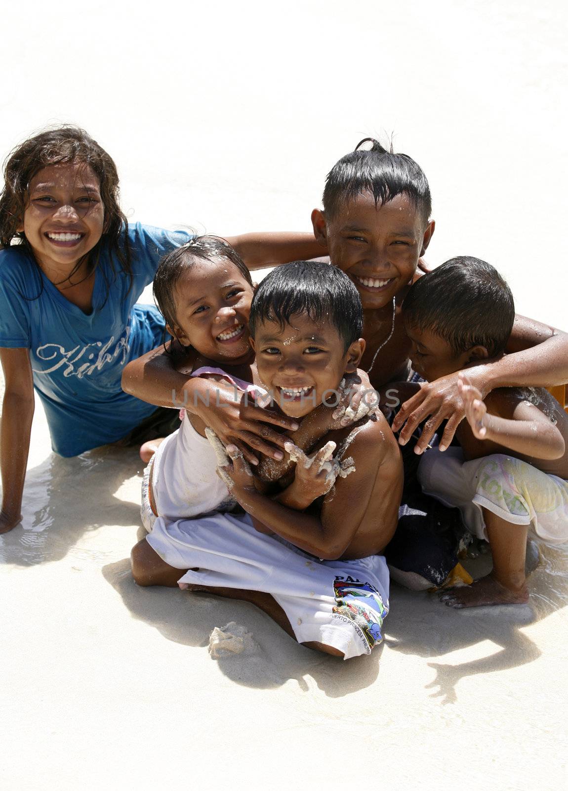 Philippines. Island Boracay. October. 2008. Cheerful Philippine children on coast of ocean. 