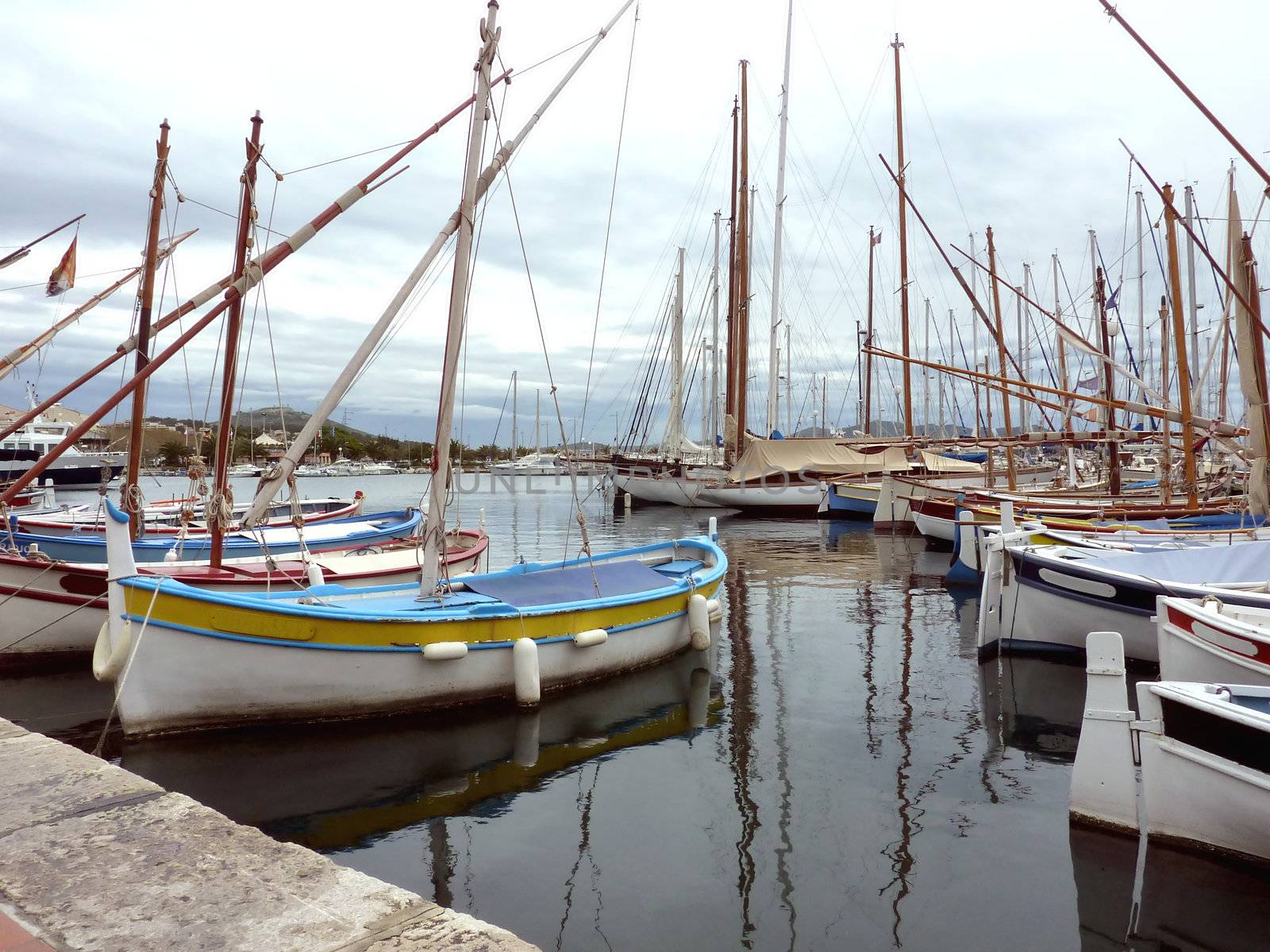 Colored small boats at Sanary-sur-mer harbor, France