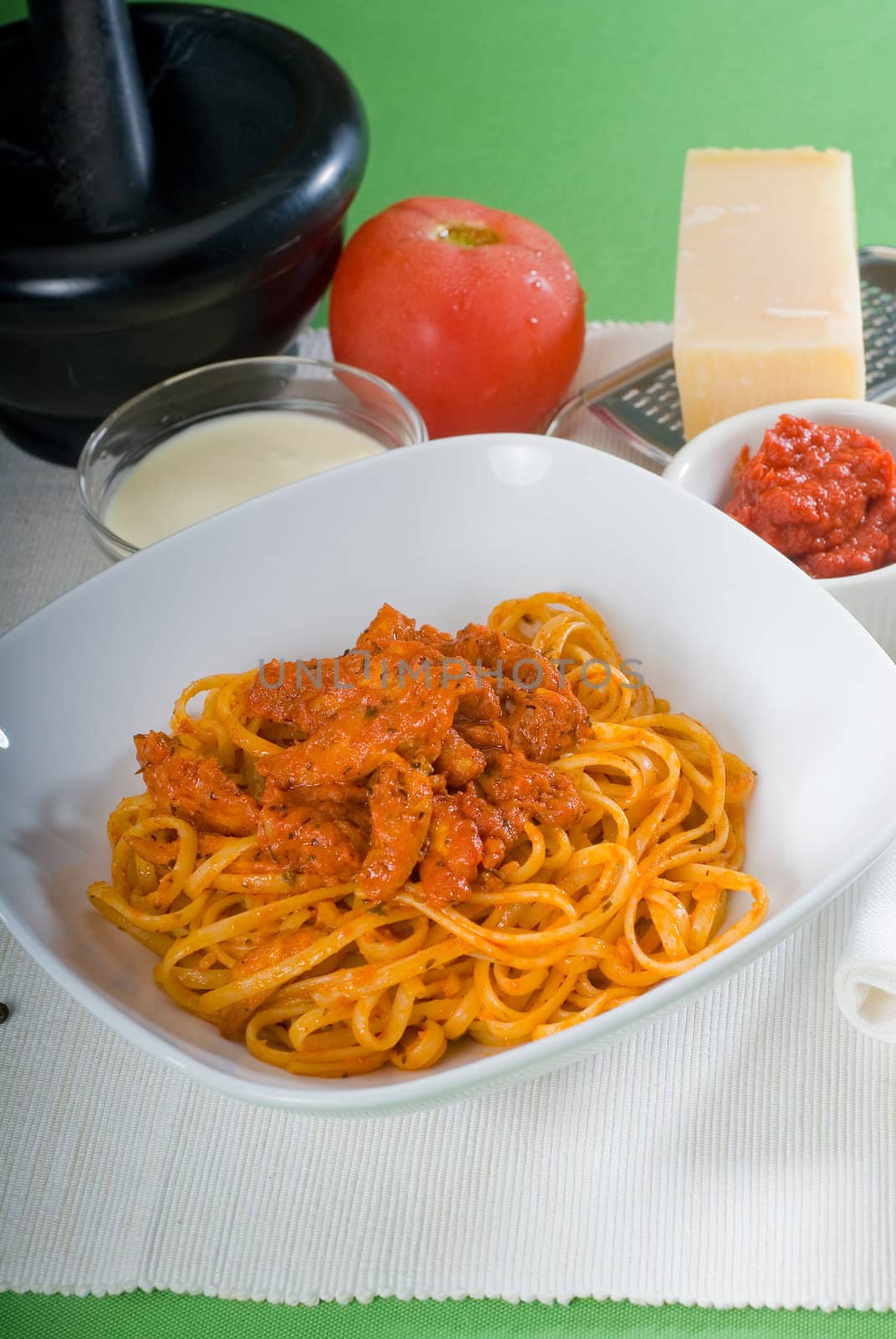 italian spaghetti pasta with fresh homemade tomato and chicken sauce