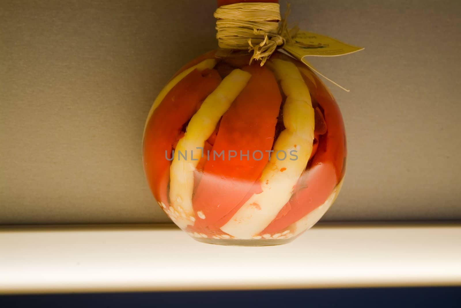 Decorative bottles on light table on kitchen