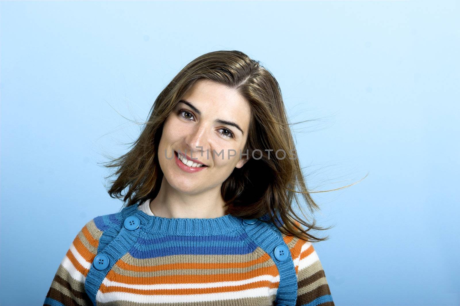 Beautiful woman portrait over a blue background