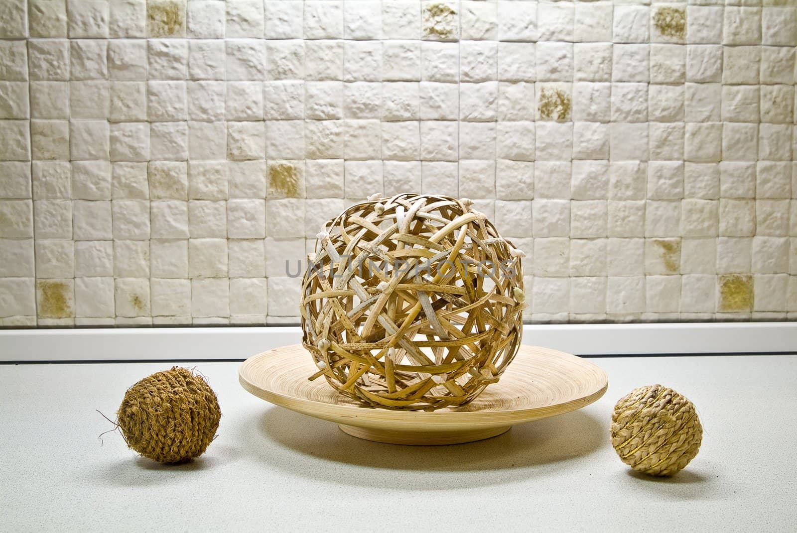 Some straw spheres in kitchen still-life