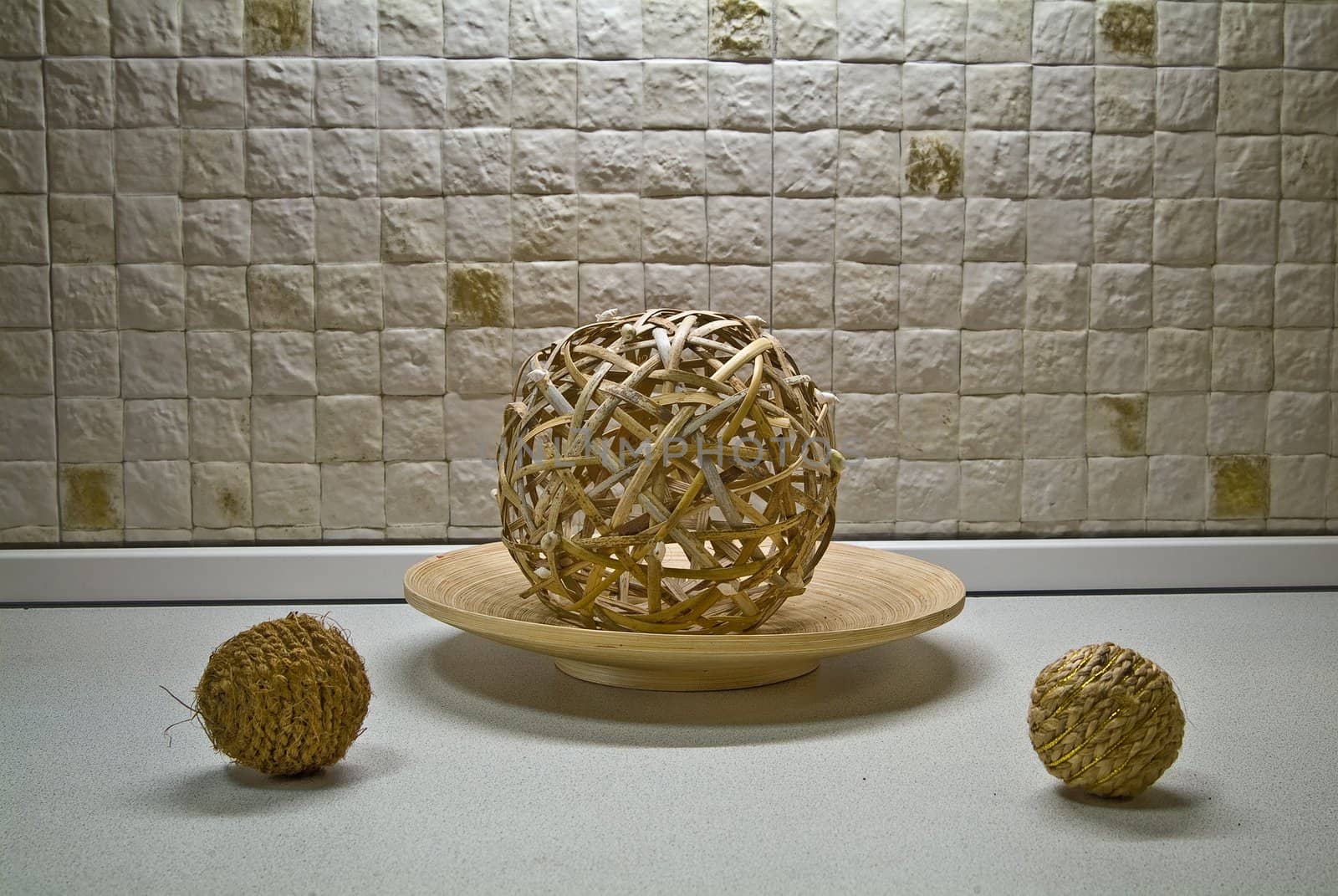 Some straw spheres in kitchen still-life