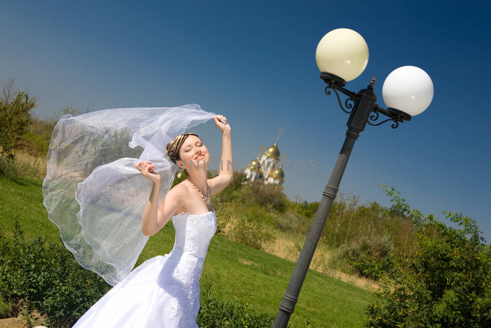 happy bride with veil
