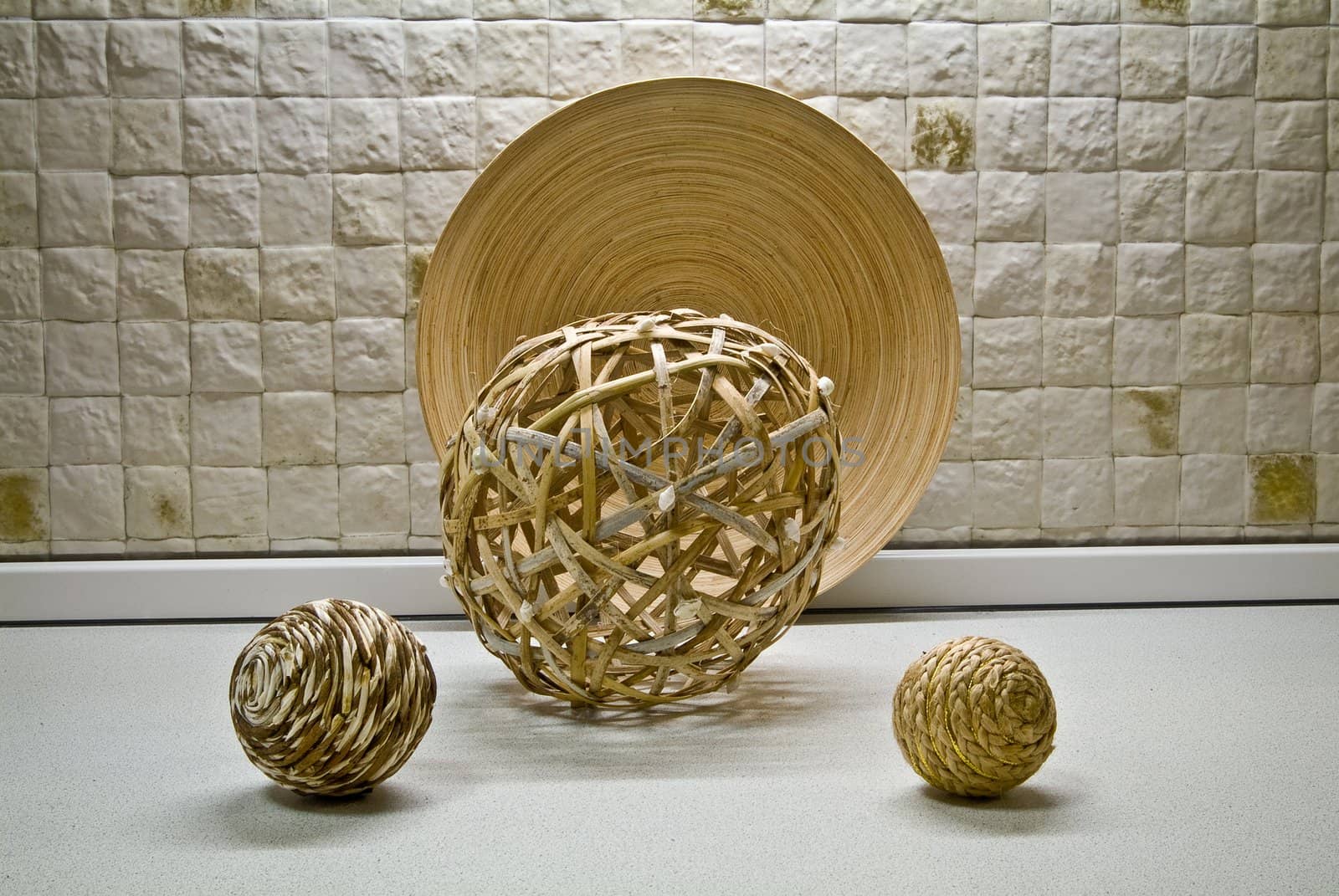 Some straw spheres in kitchen still-life by palomnik