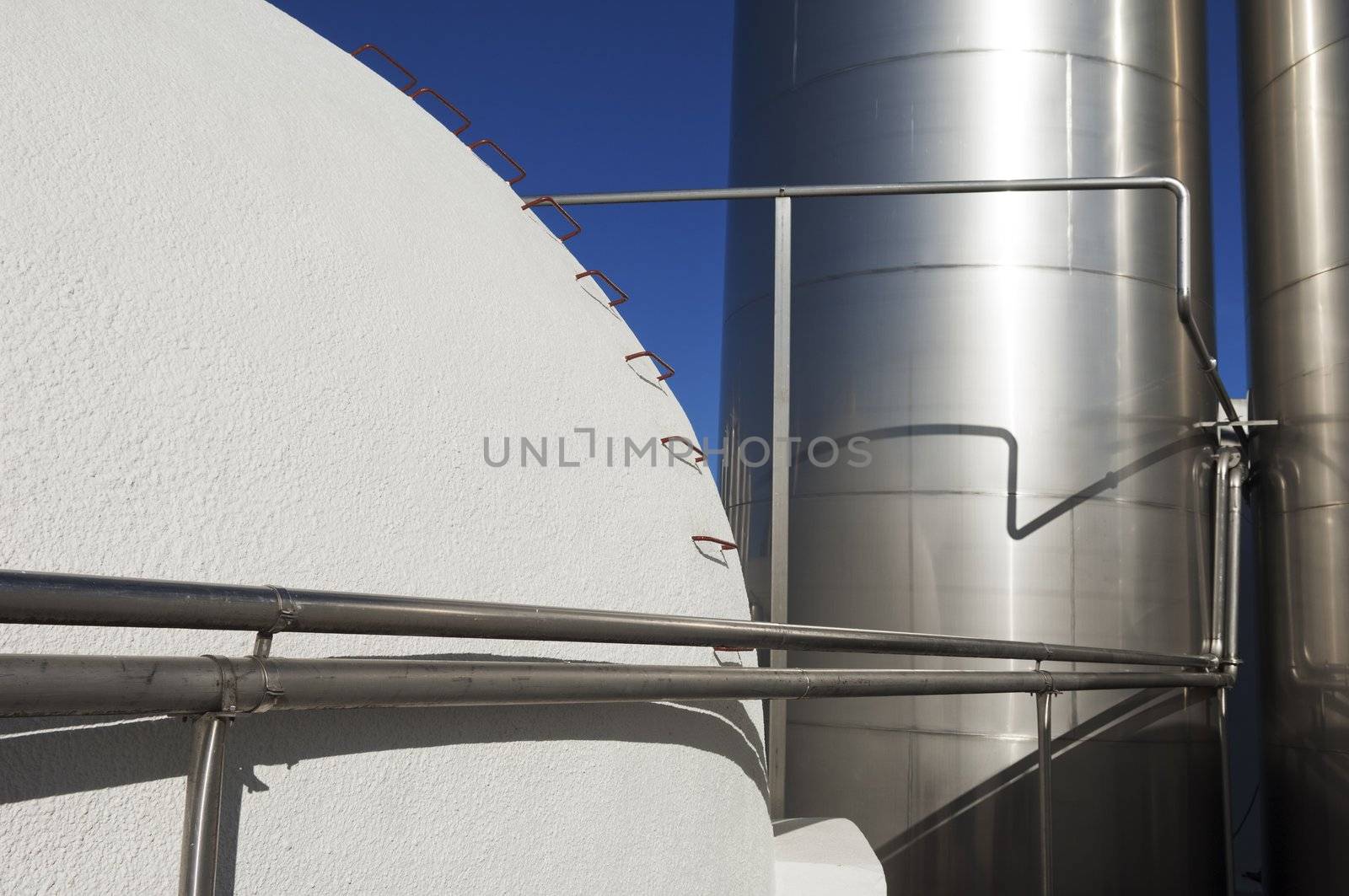 Stainless steel and concrete tanks in a winery, Alentejo, Portugal