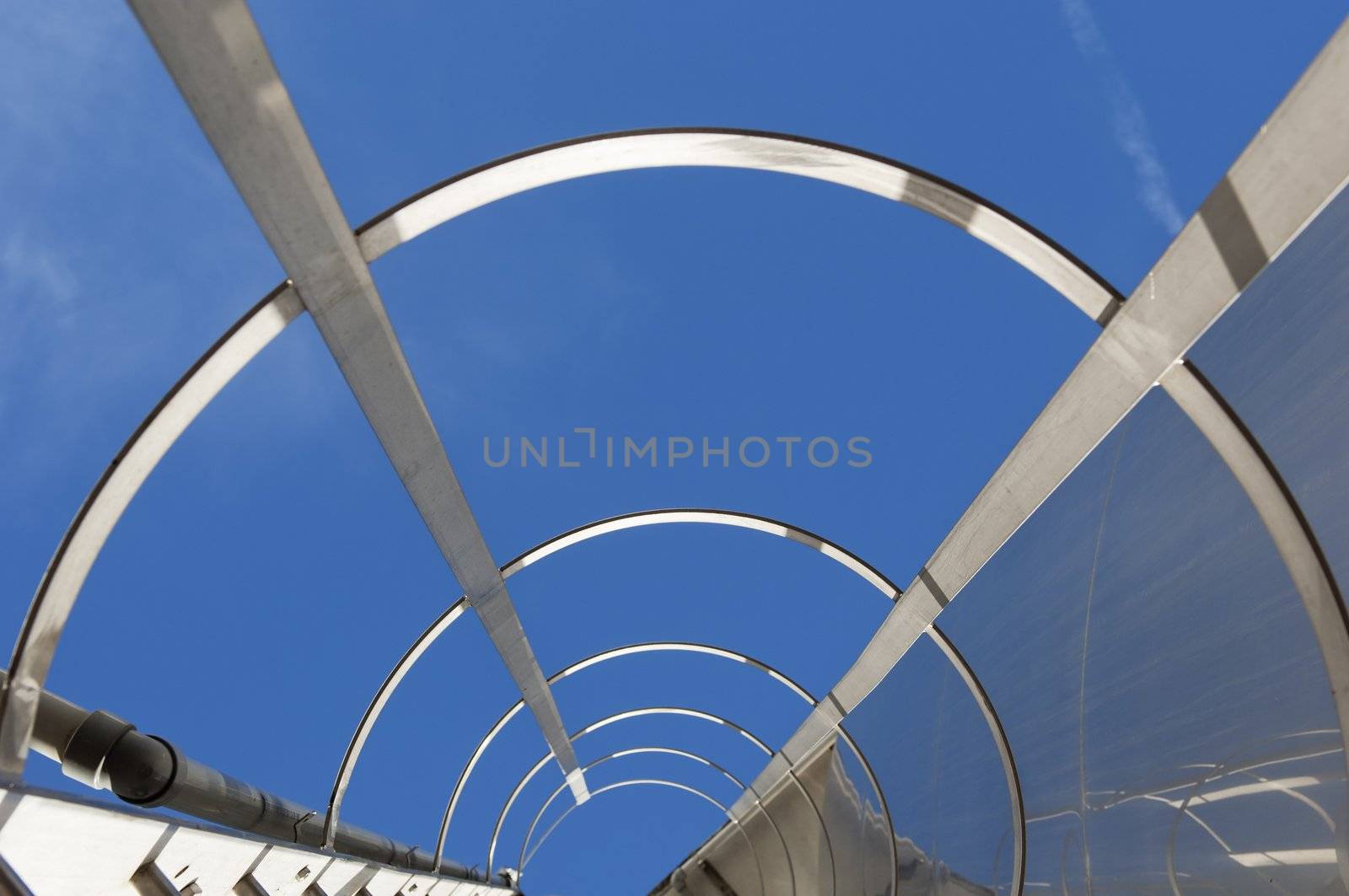 Stainless steel stairway in the tanks of a modern winery