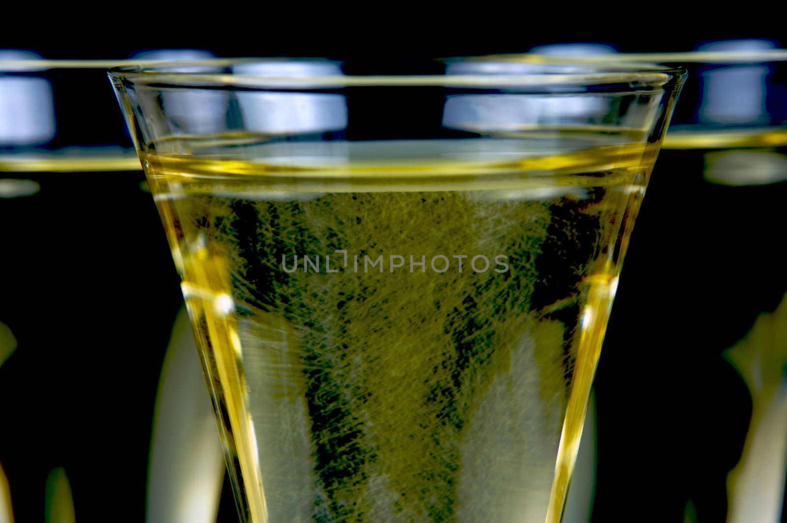 Sparkling wine isolated against a black background