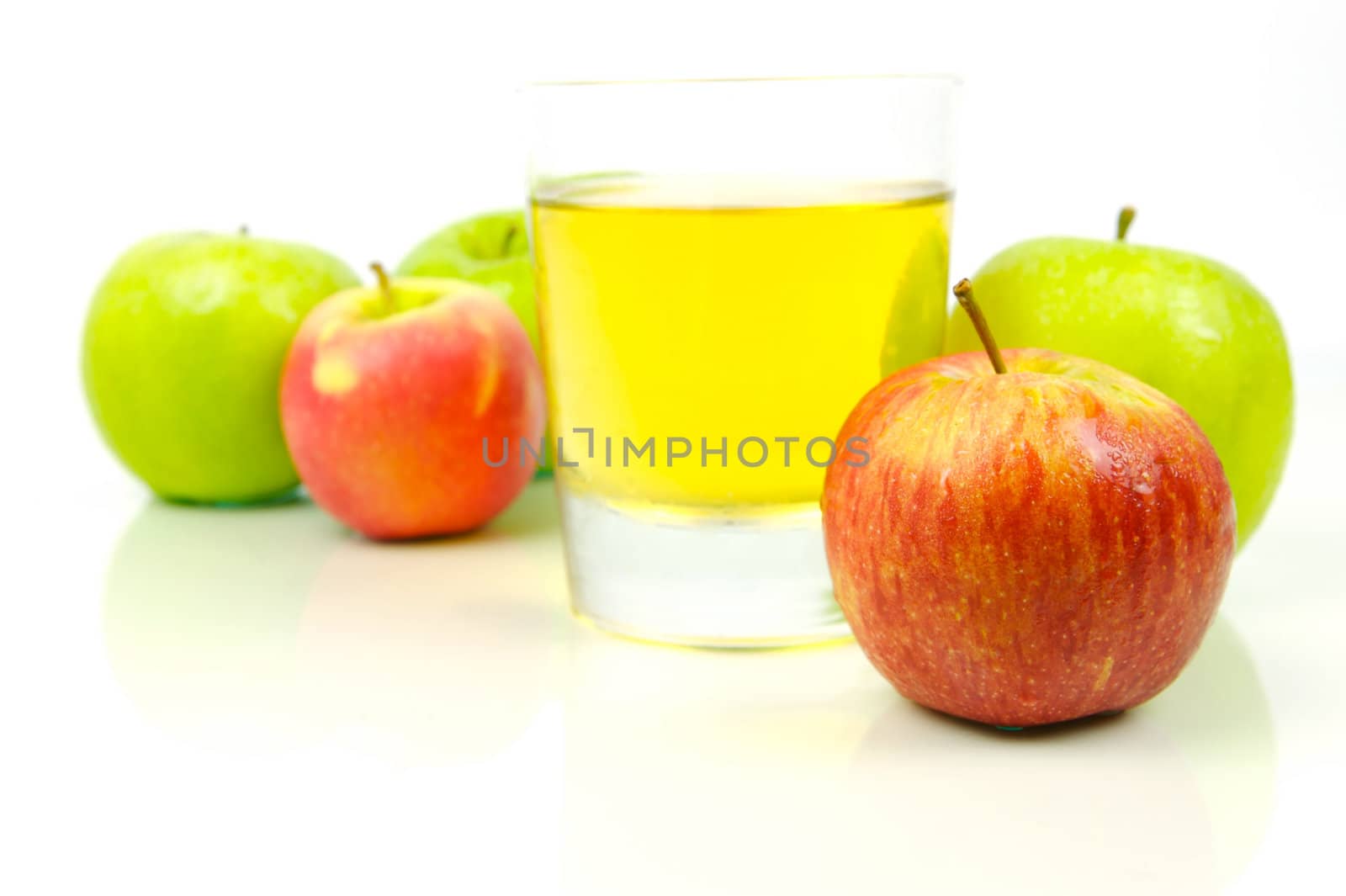 Apple juice isolated against a white background