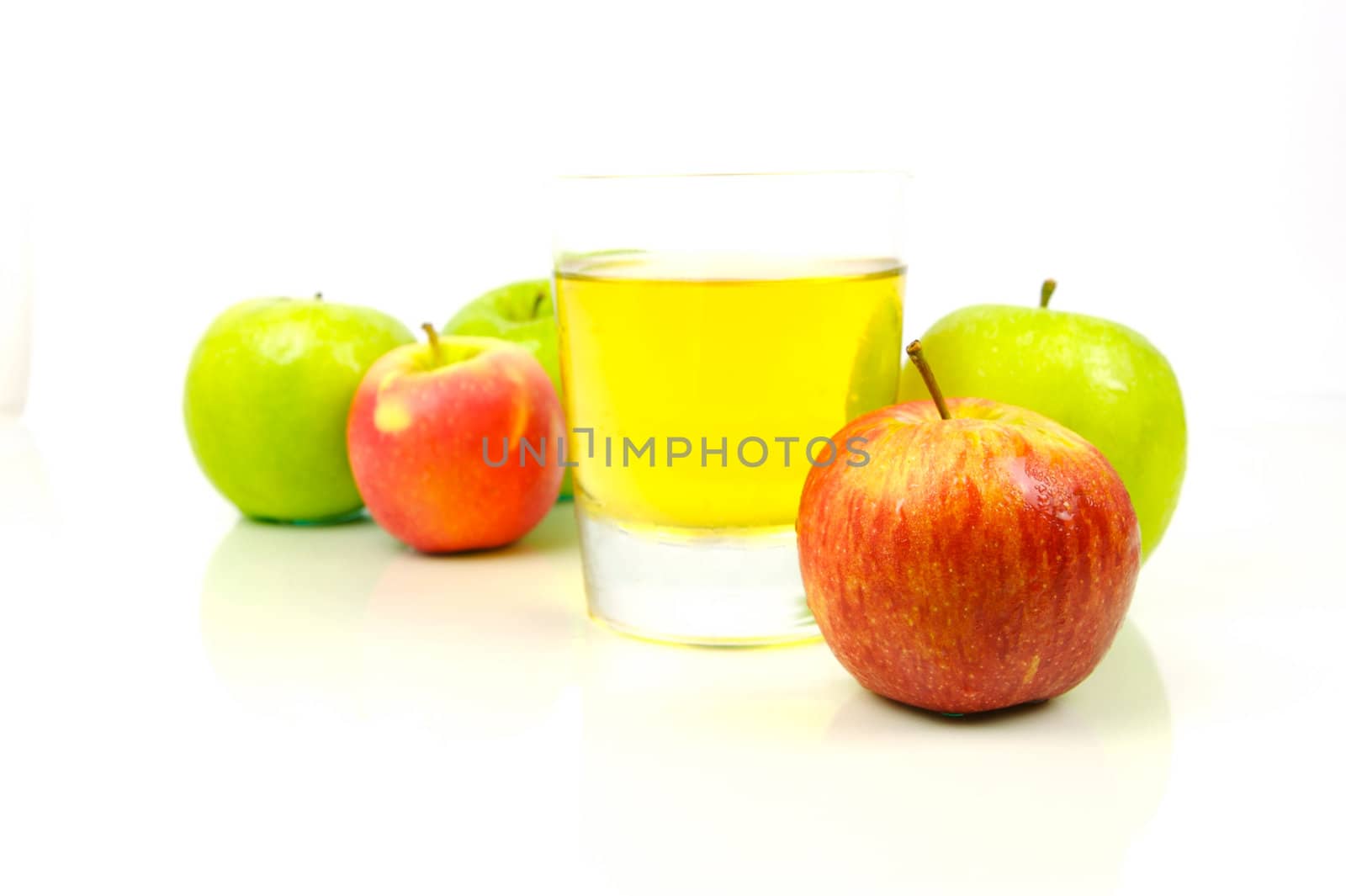 Apple juice isolated against a white background