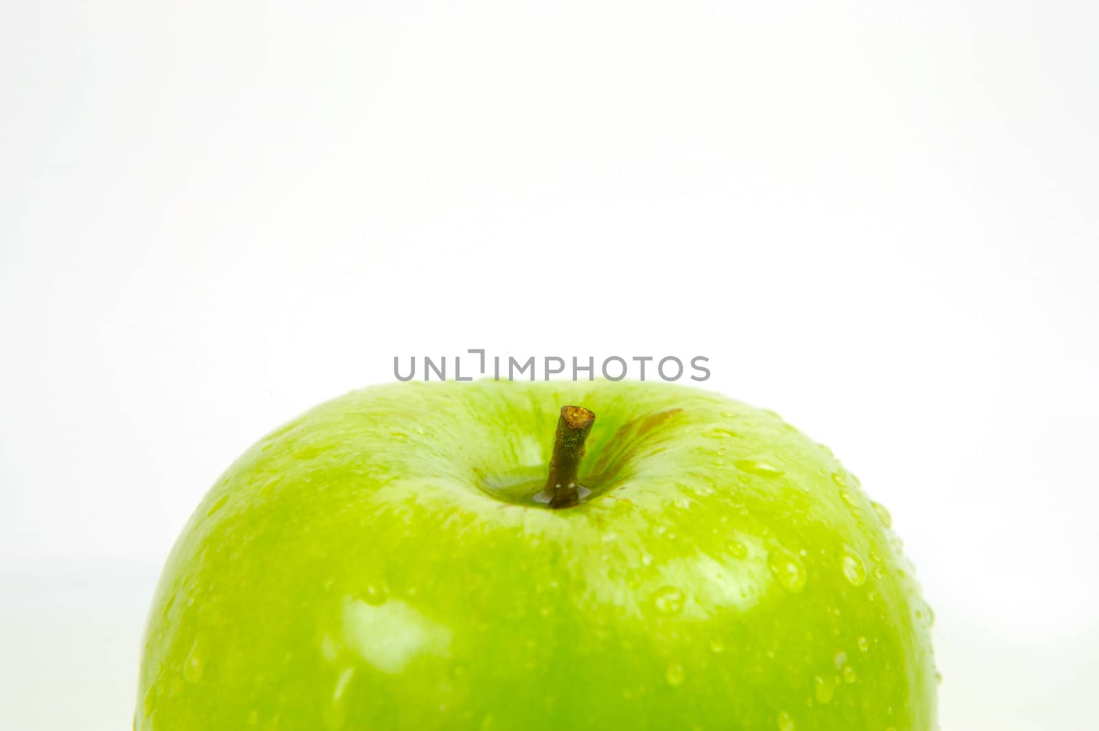 Green apples isolated against a white background