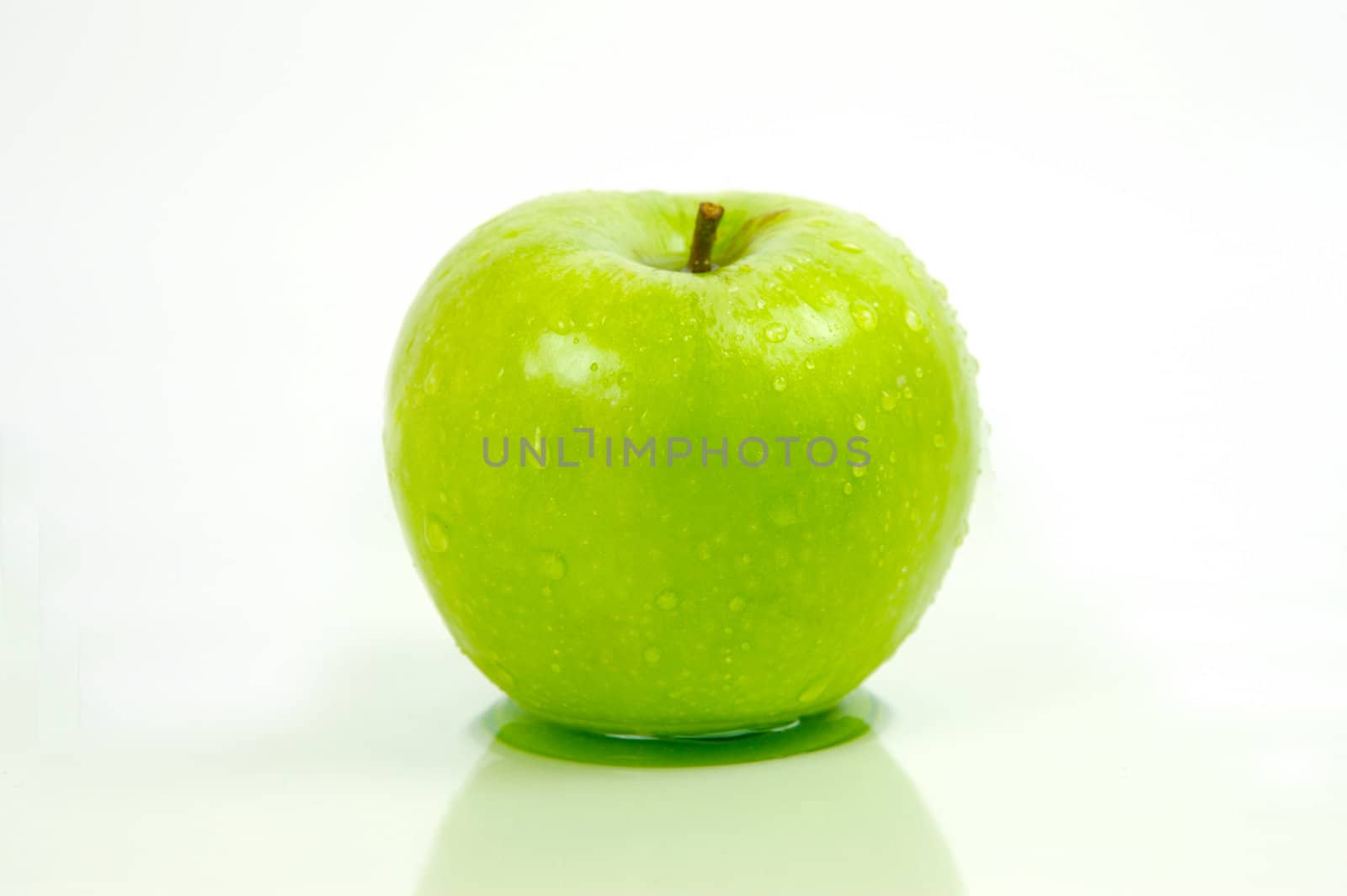 Green apples isolated against a white background