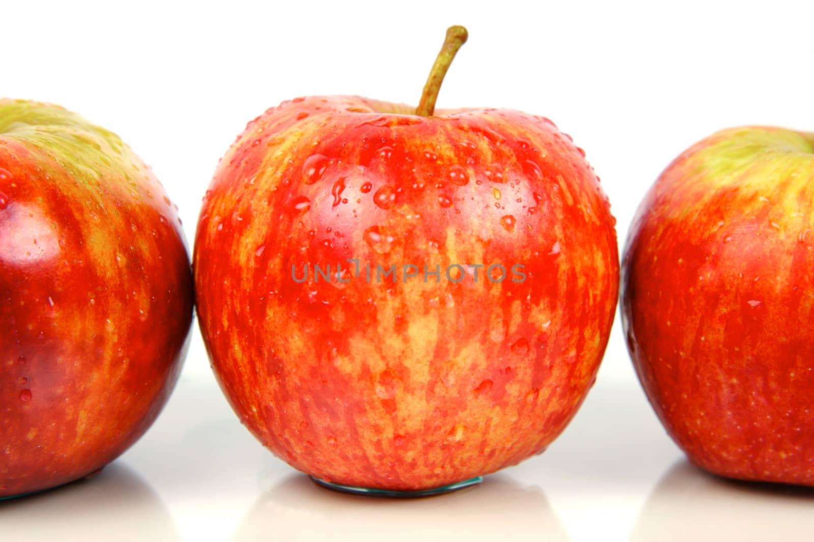 Red apples isolated against a white background