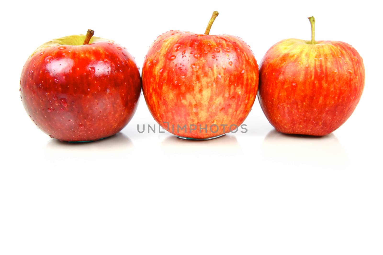 Red apples isolated against a white background