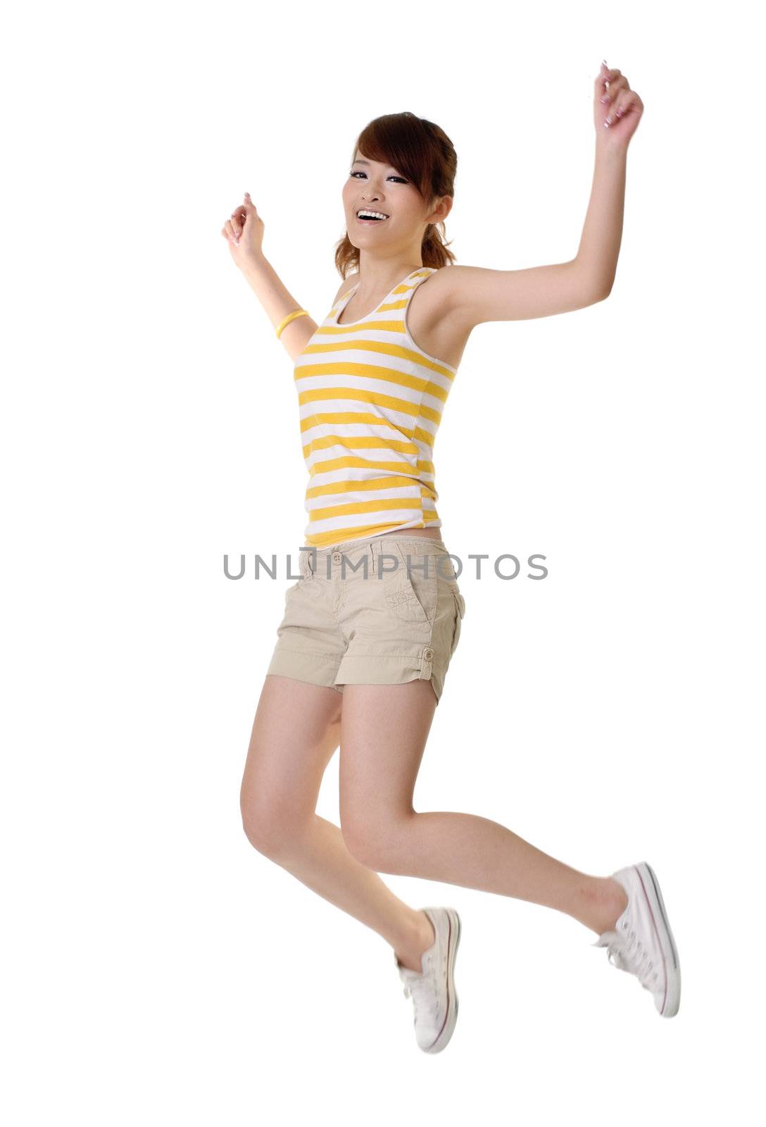 Happy girl jumping with smiling face isolated on white background.