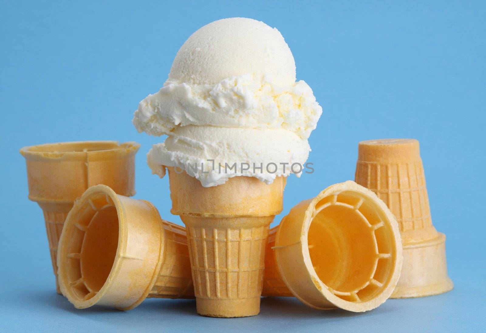vanilla ice cream cone, blue background