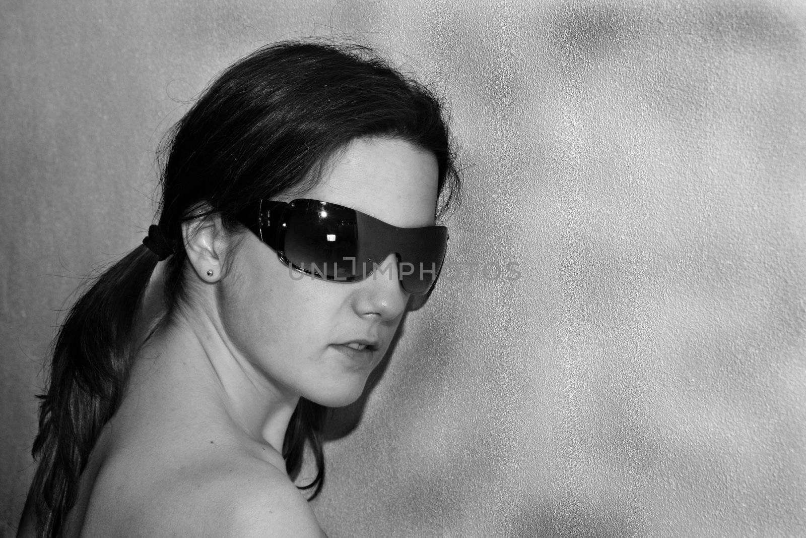 girl fashion glasses over black background