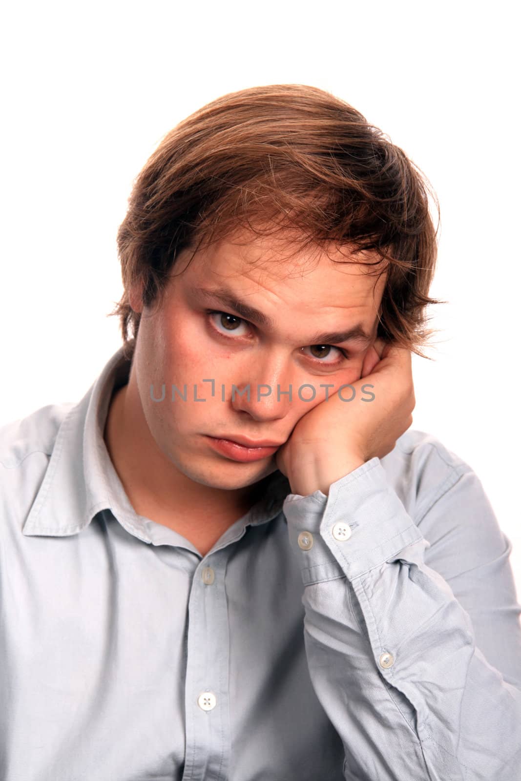 casual young man portrait over white background