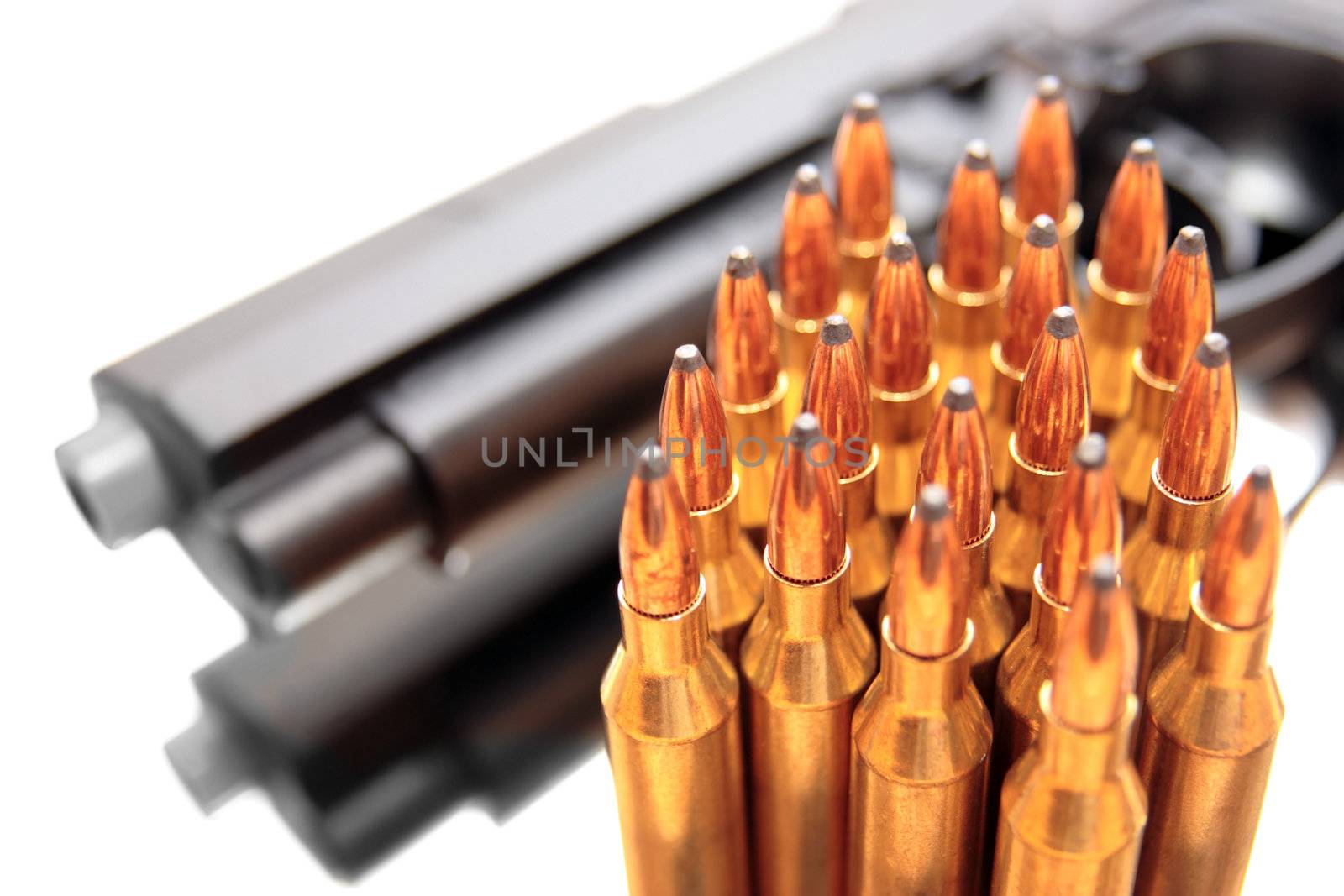 gold ammo and a handgun depicting gun culture