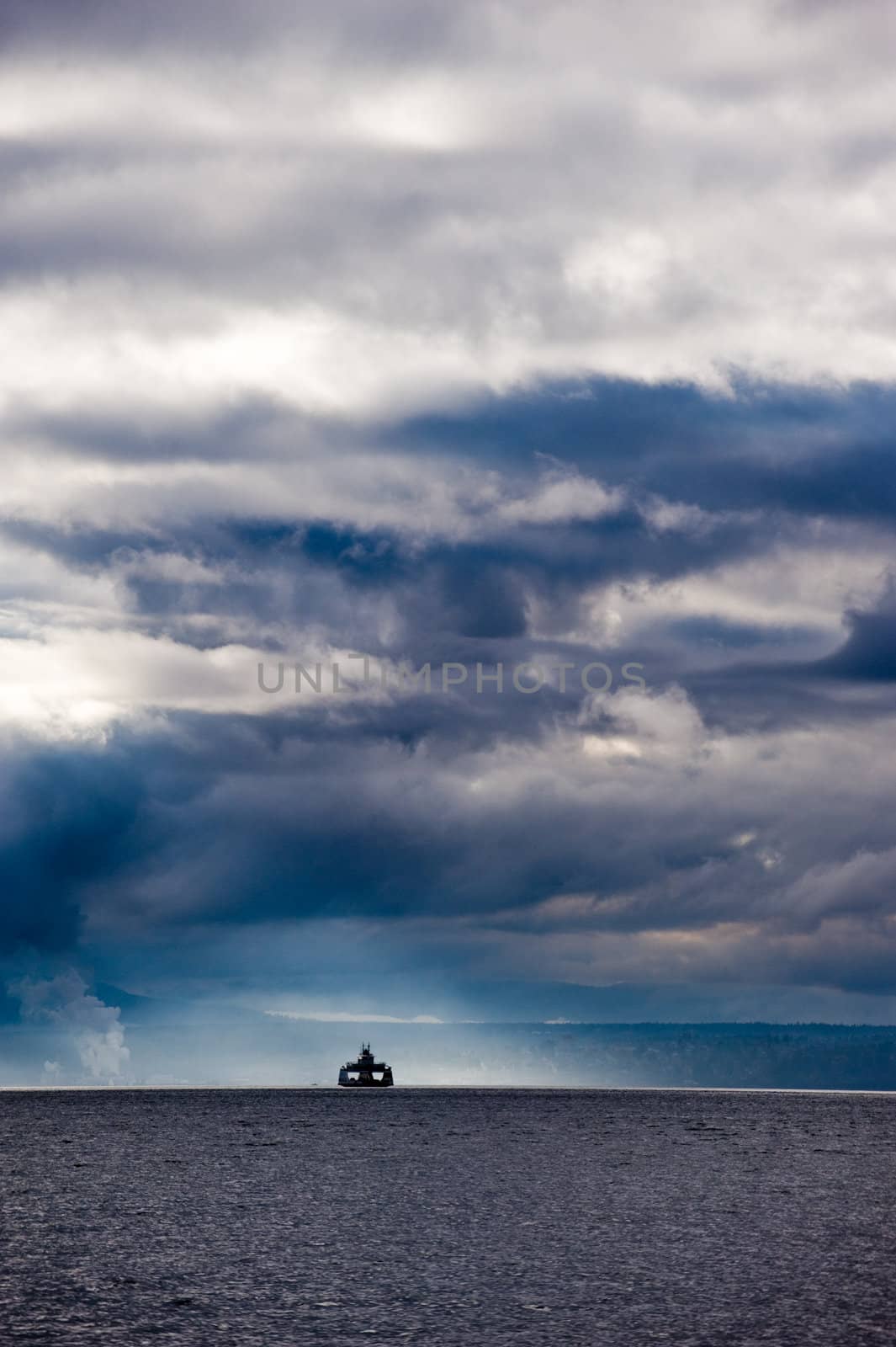 ferry boat with storm clounds