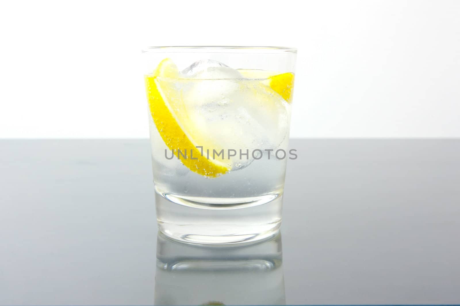 Ice water with a wedge of lemon