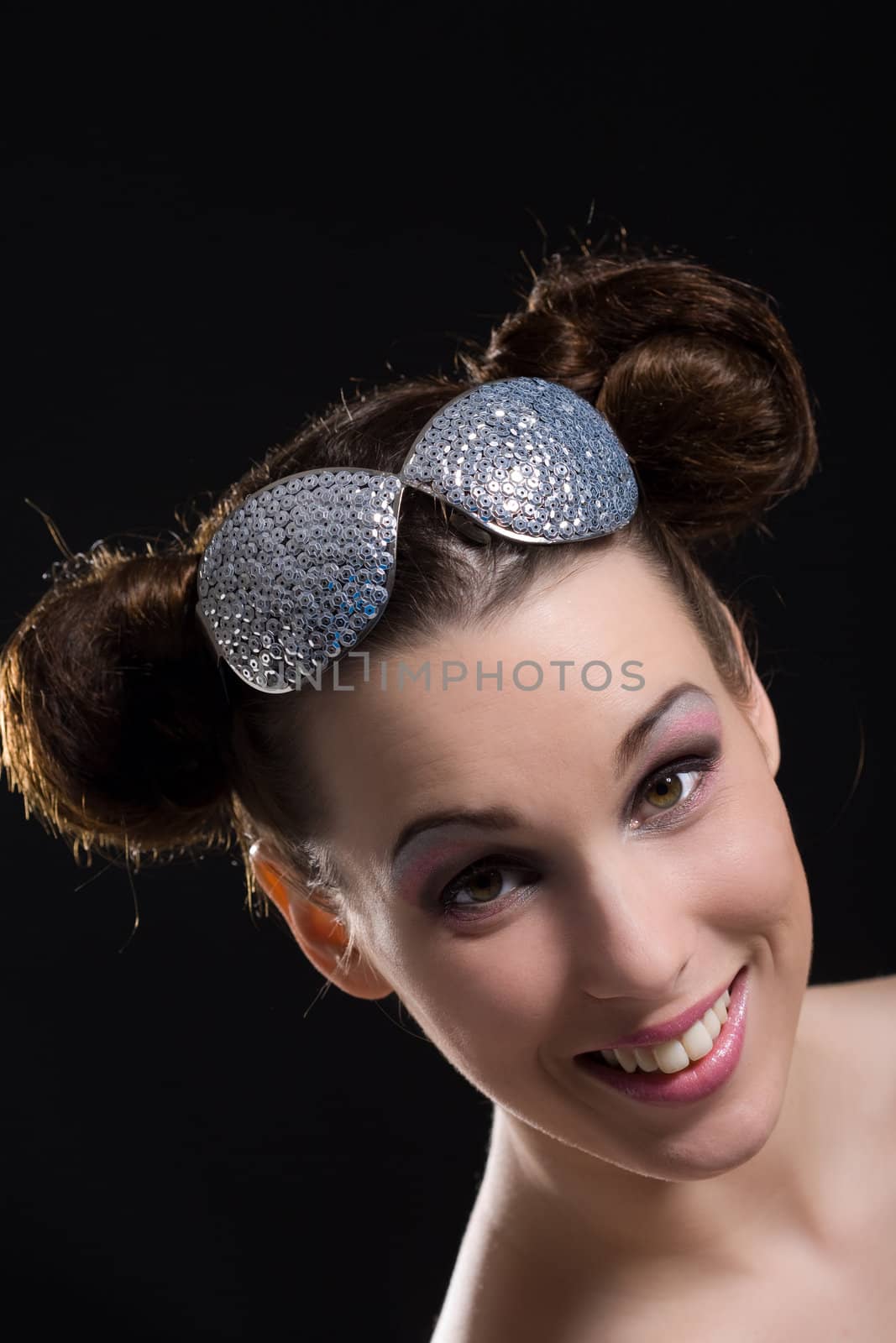 Woman with funny hairstyle looking cheeky