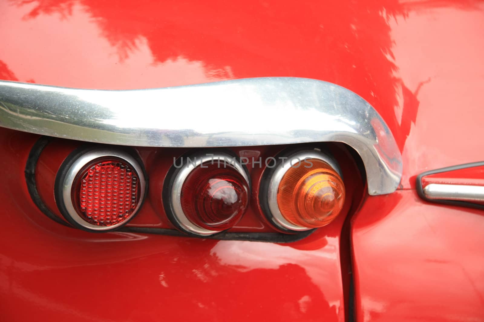 three backlights, detail of a vintage French car