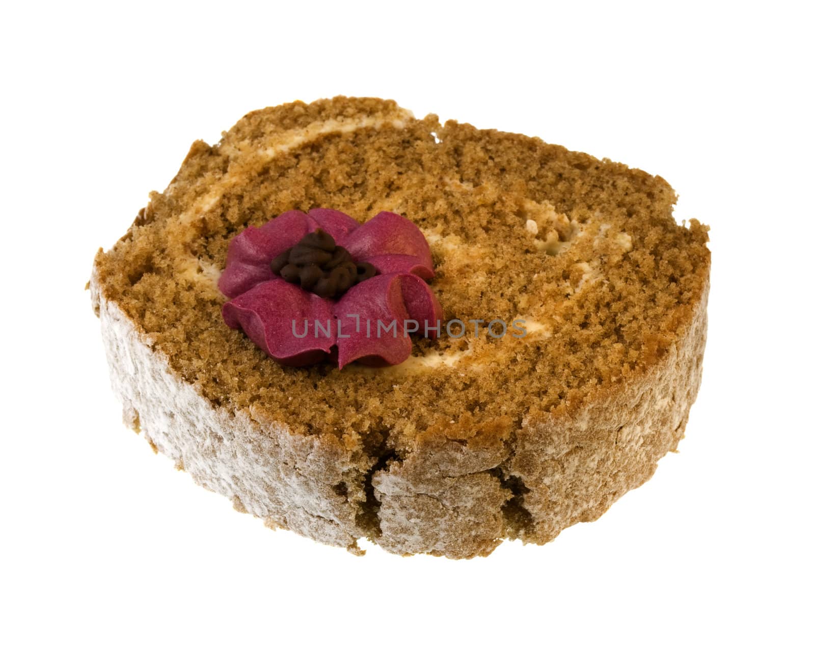 a slice of pumpkin roll with chocolate and sugar flower decoration, isolated on white