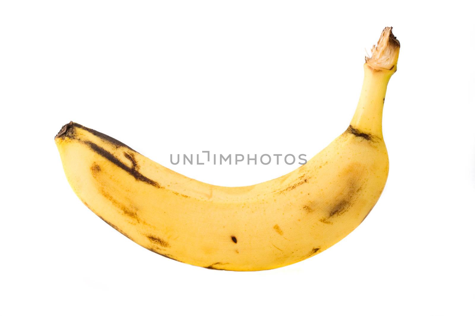 single banana isolated on white by bernjuer