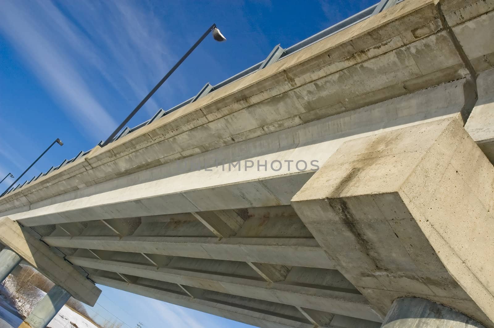 close-up shot of a concrete rusty bridge